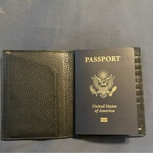Coach soft pebble leather passport wallet.
